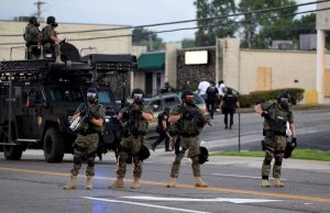 Ferguson's paramilitary police force patrols the streets. If something dramatic isn't done soon, much of Main Street, USA may one day look like this. Via Business Insider.